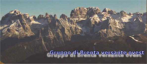 Panoramica del Gruppo di Brenta visto da ovest - Cima Tosa regina del gruppo con la parete sud-ovest dove venne aperta la"via delle Cascate" 